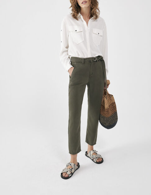 Women’s khaki baggy jeans with silver-tone buckle belt