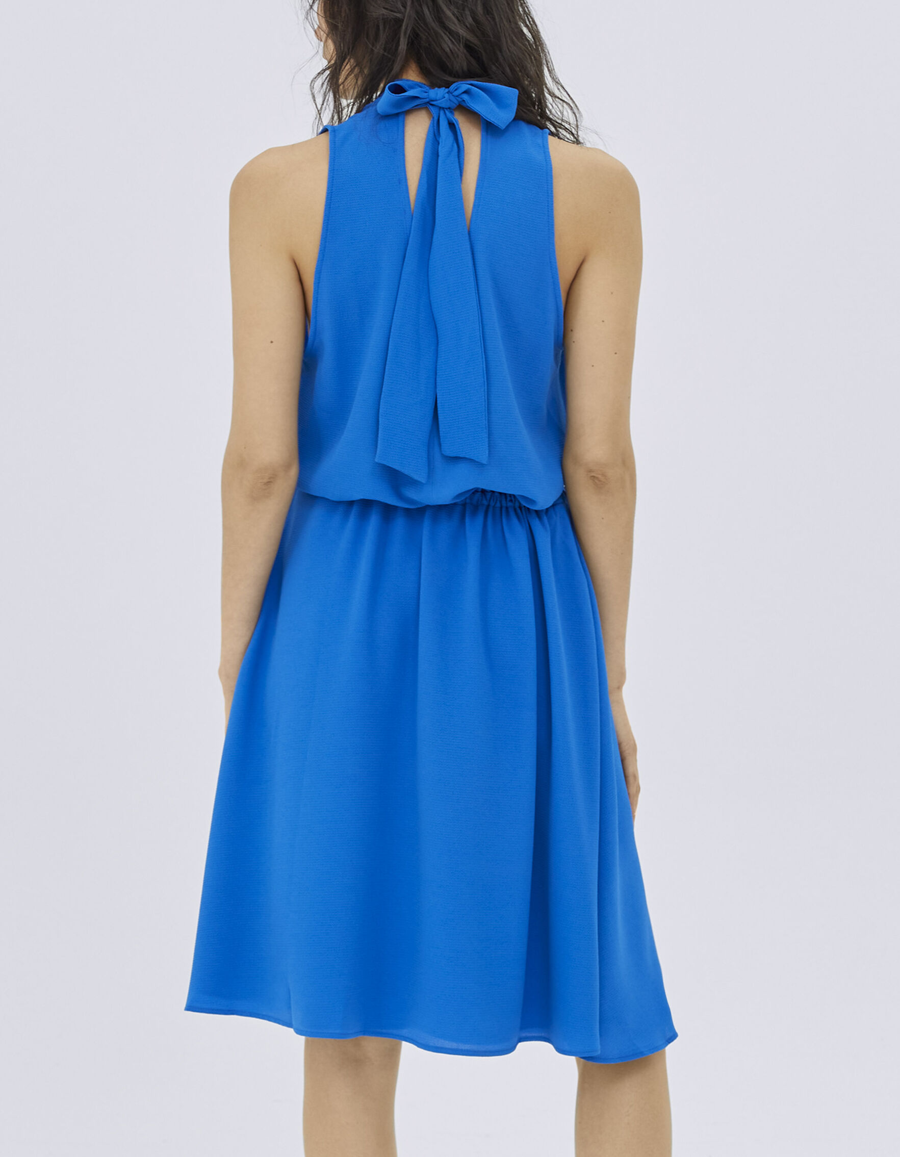 Women s blue sleeveless dress with neck tie on back