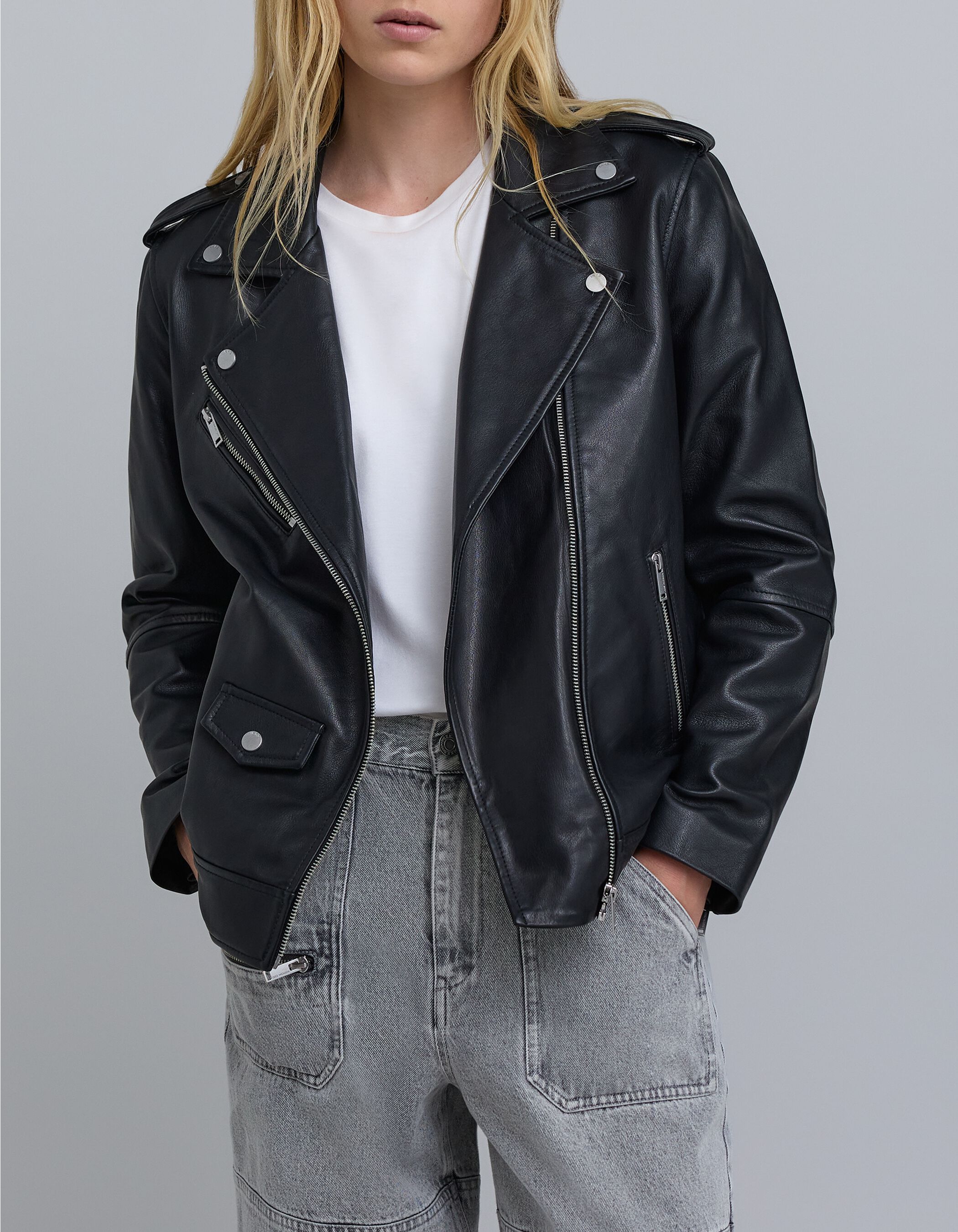 Women's mid-length black leather biker jacket