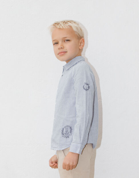 Boys’ blue shirt with white stripes and embroidery