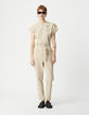 Women's beige jumpsuit with asymmetrical closure-1