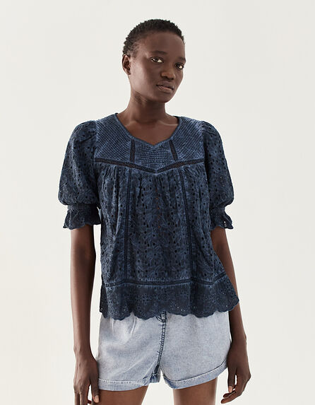Women’s eyelet embroidery blouse with acid wash treatment