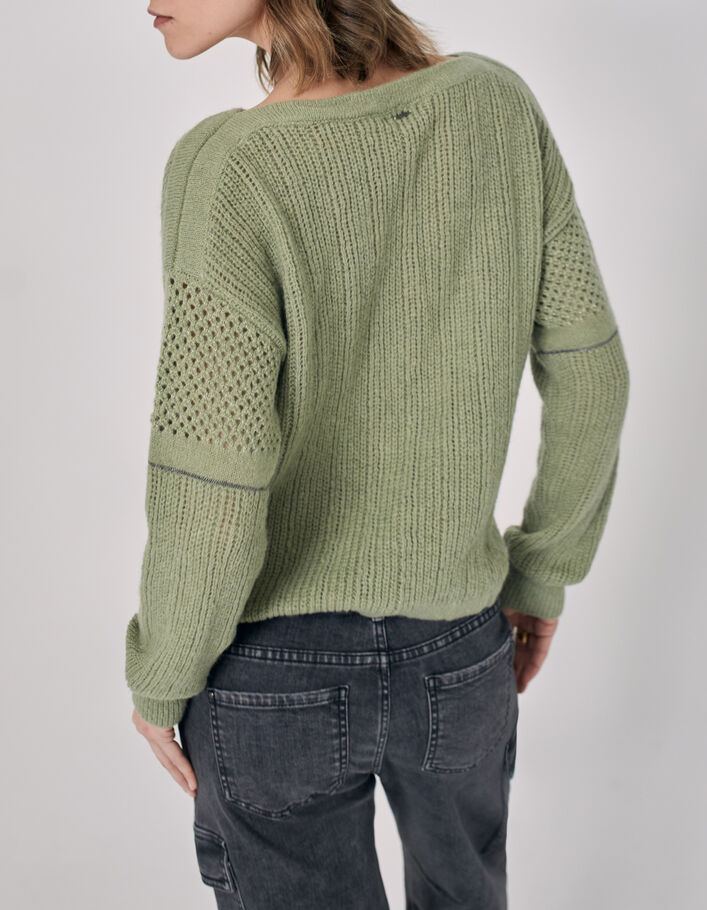 Pull kaki en maille avec jeux de point et chaînes sur les manches femme