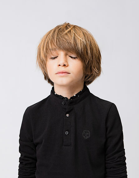 Boys’ black polo shirt, rock trompe-l'oeil shirt collar