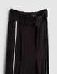 Pantalón negro ancho con pliegue y tiras laterales niña-2