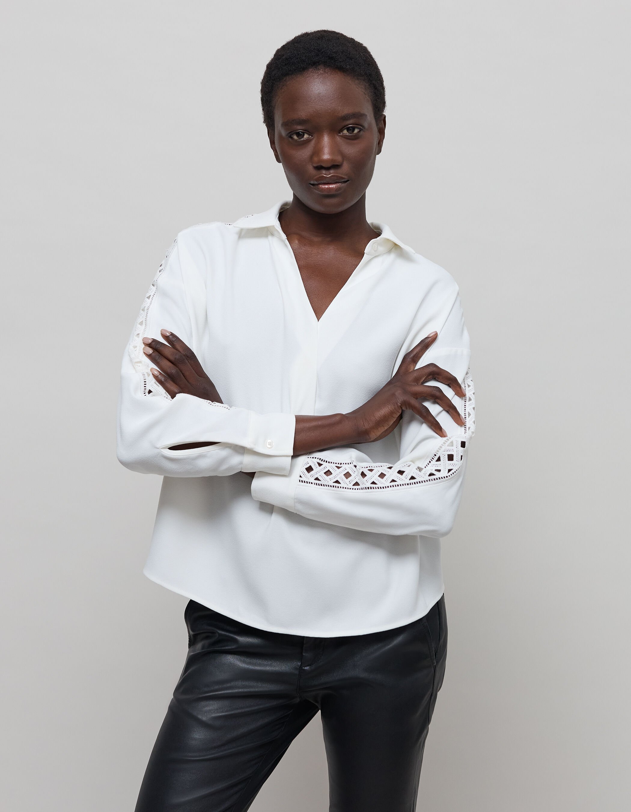 Women s white blouse with graphic lace sleeves IKKS