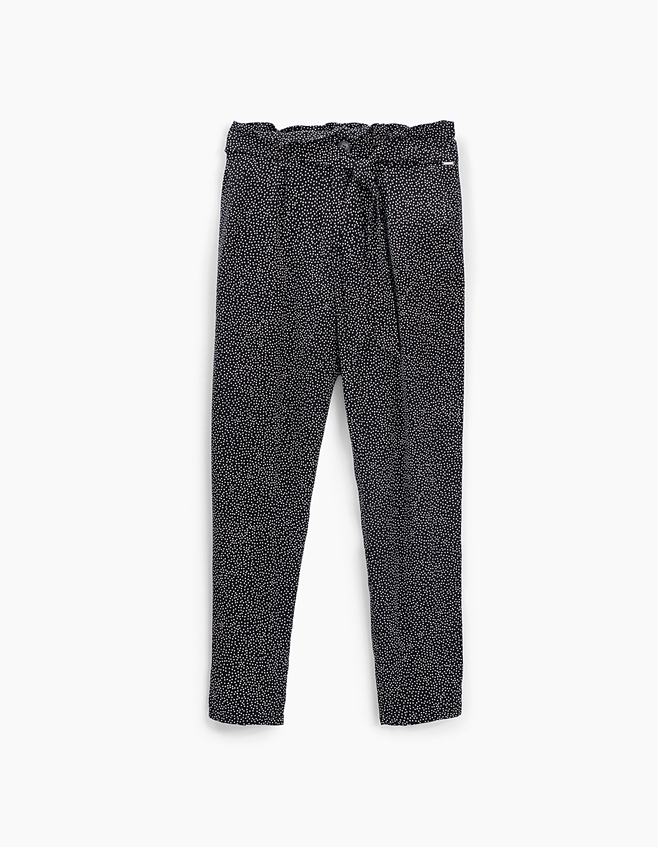 Pantalón paper bag negro fluido estampado lunares niña