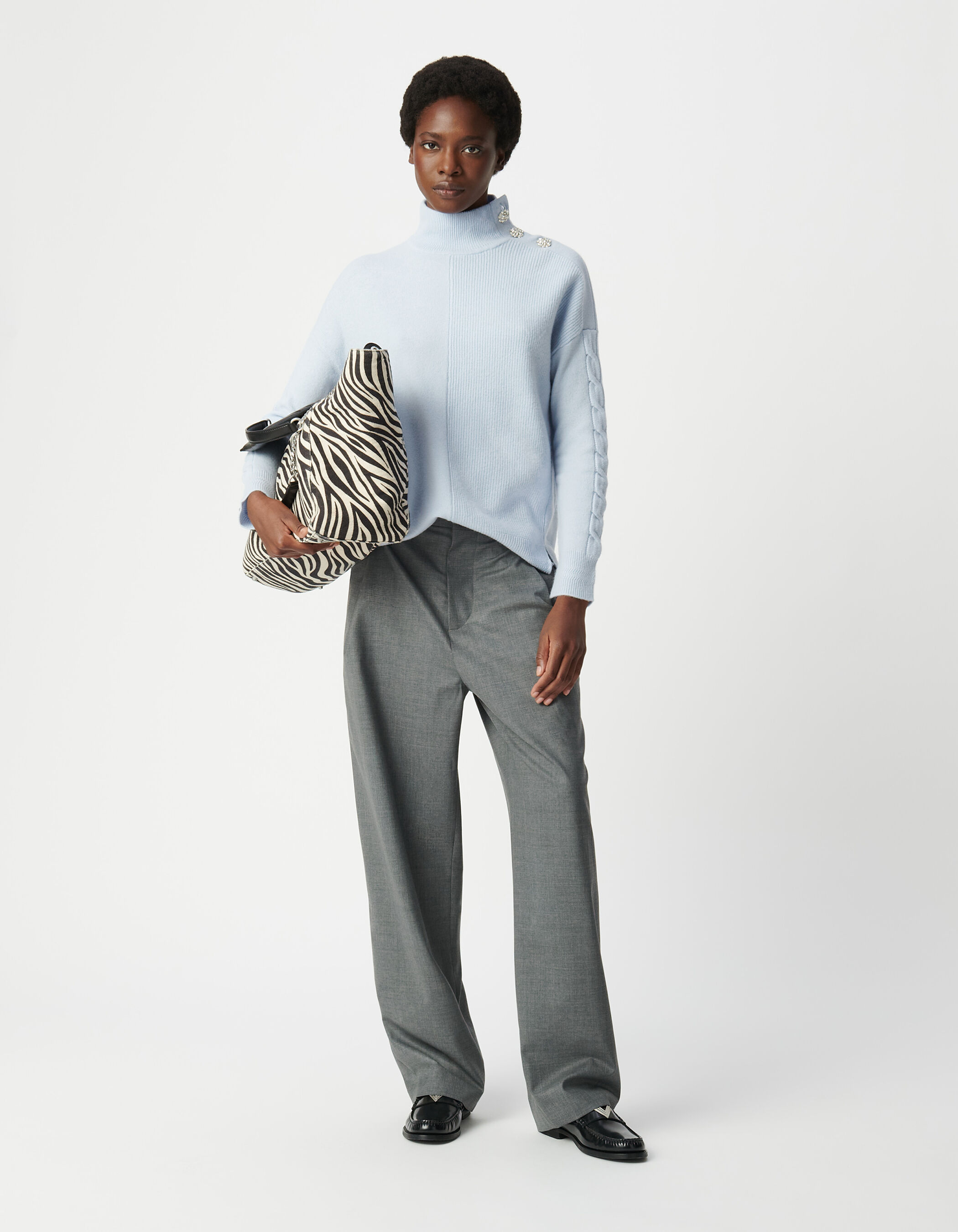 Women's sky blue stand-up collar knit sweater with rhinestone buttons