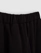 Pantalón negro ancho con pliegue y tiras laterales niña-5