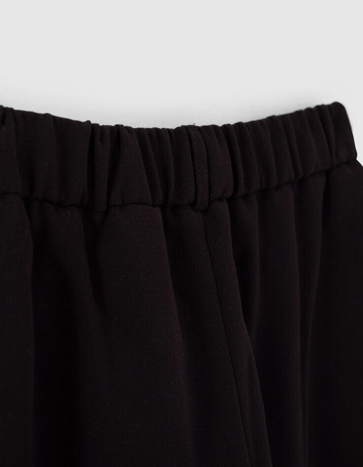 Pantalón negro ancho con pliegue y tiras laterales niña-5 Pantalón negro ancho con pliegue y tiras laterales niña-5