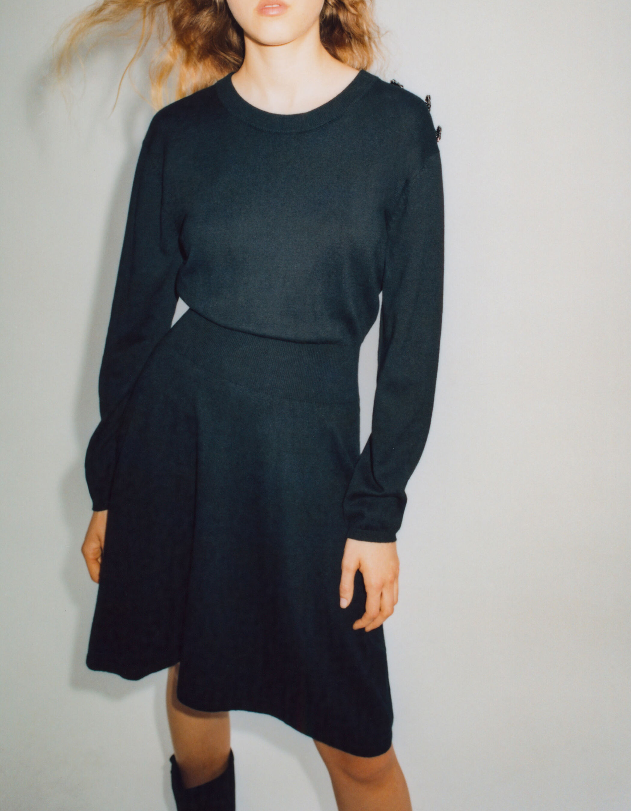Women s black sweater dress with diamante buttons