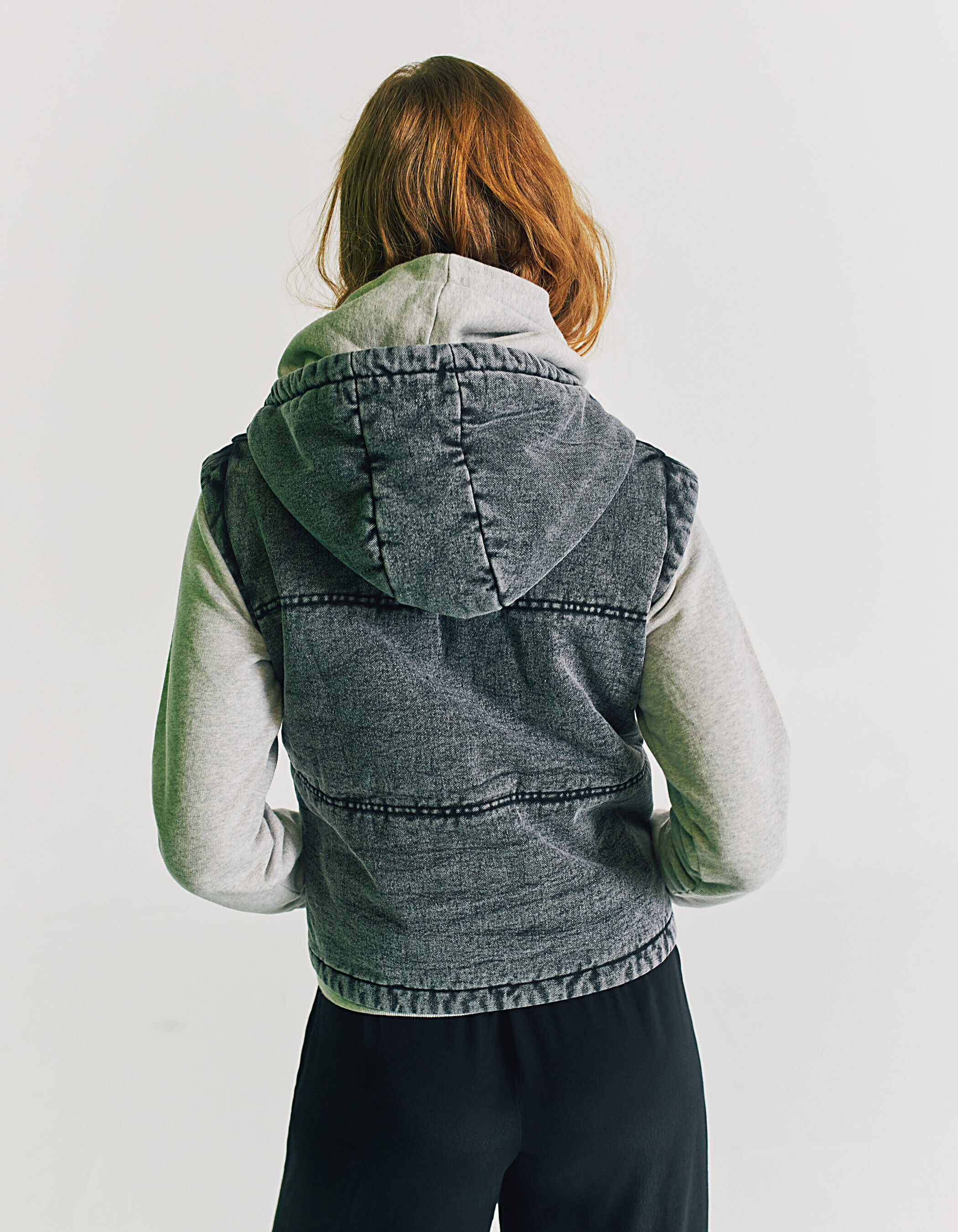 Women's acid washed denim hooded bodywarmer