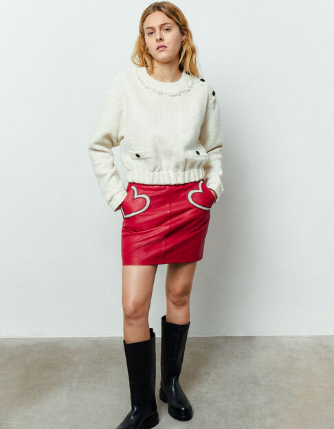 Women’s red leather skirt with white hearts on pockets