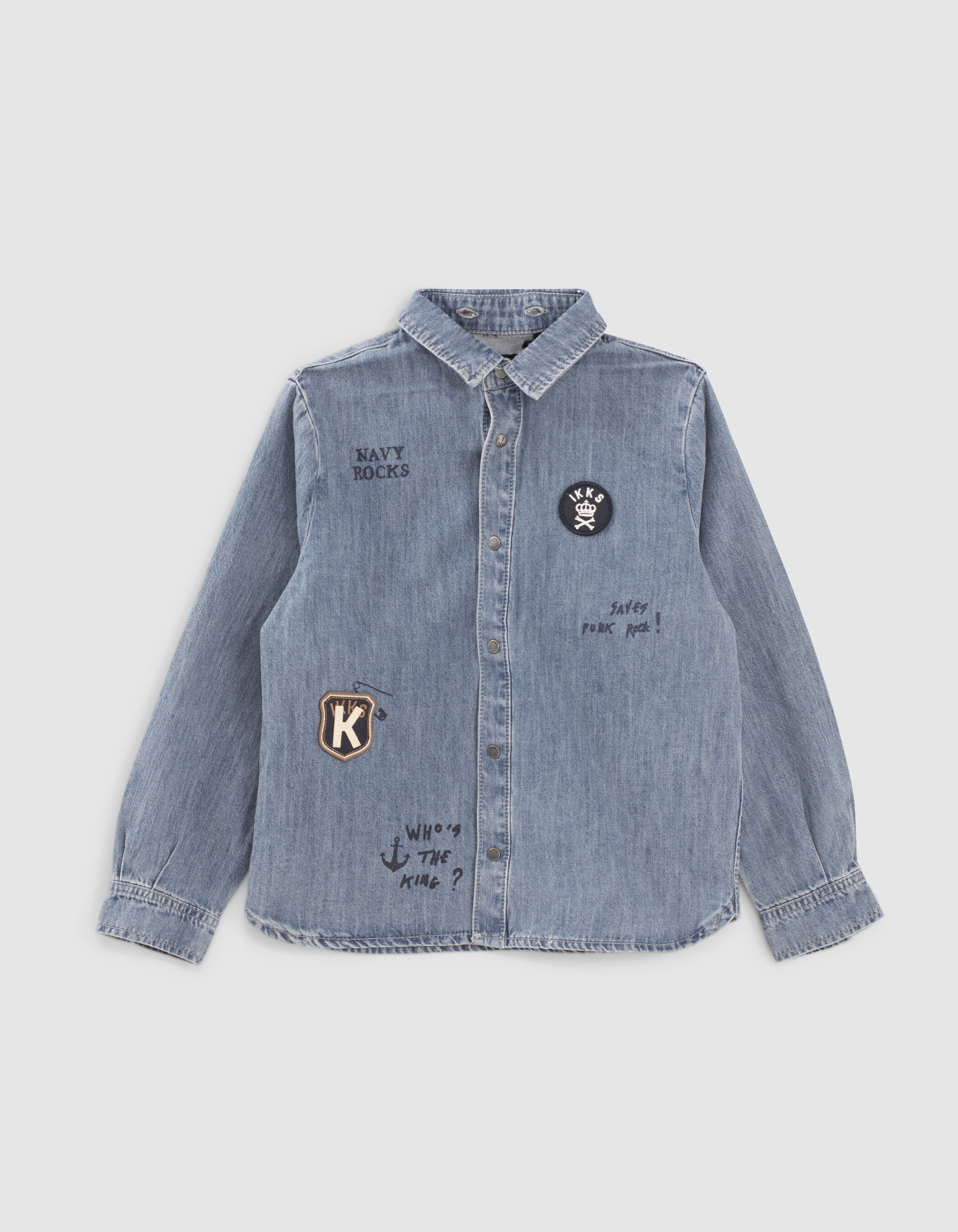 Denim shirt shop with badges