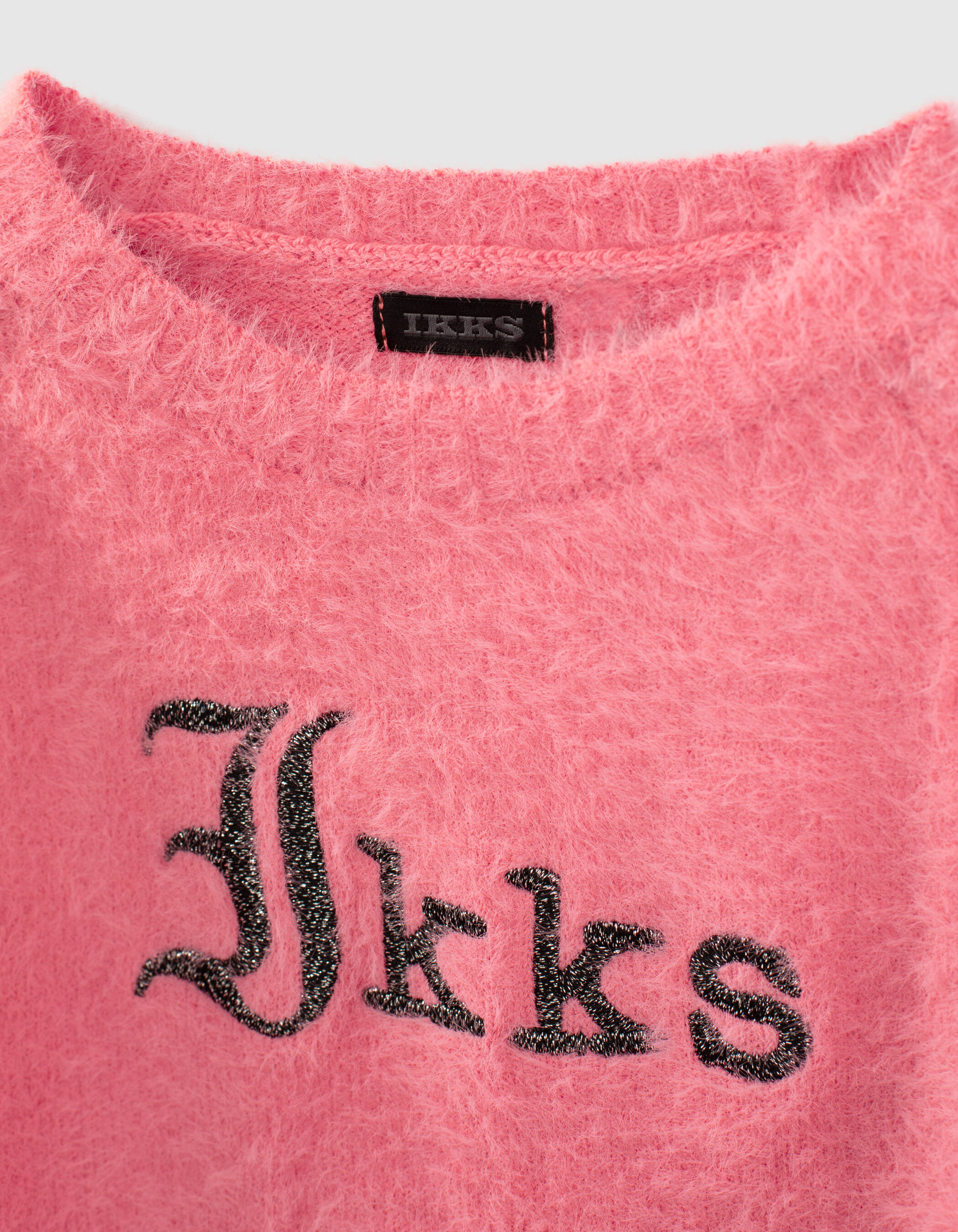 Girls bright pink knit sweater epaulets and embroidery