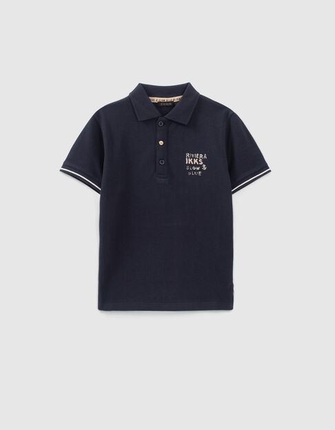 Boys’ navy polo shirt with XL flag patch on back