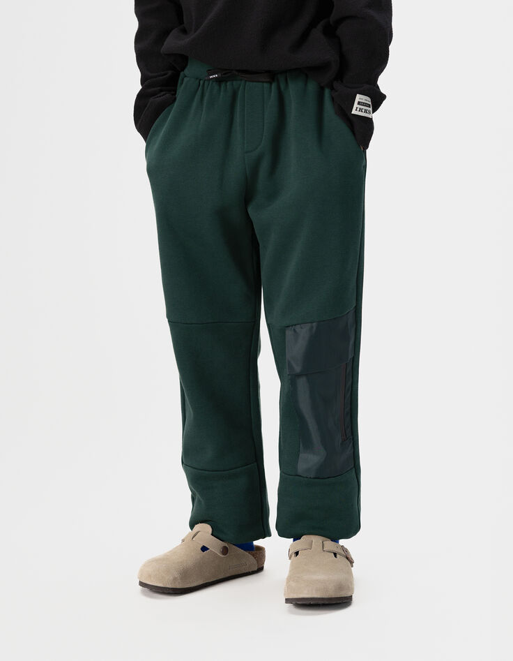 Jogging verde bolsillo bimaterial niño-1
