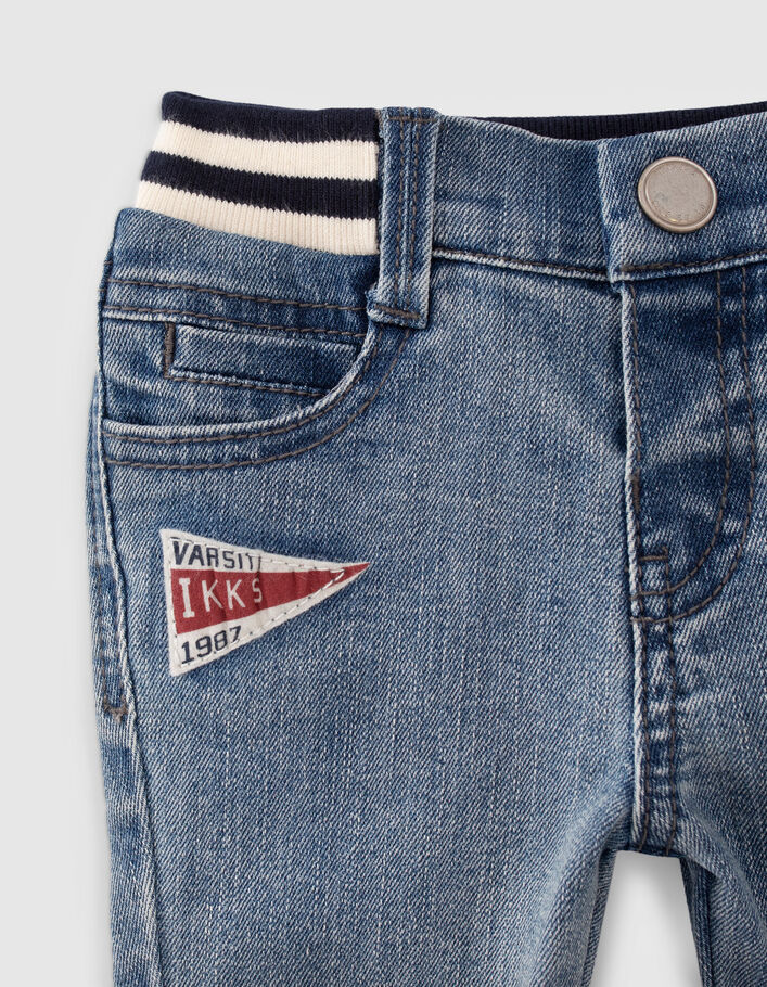 Baby boys’ blue jeans with print and ribbed waistband