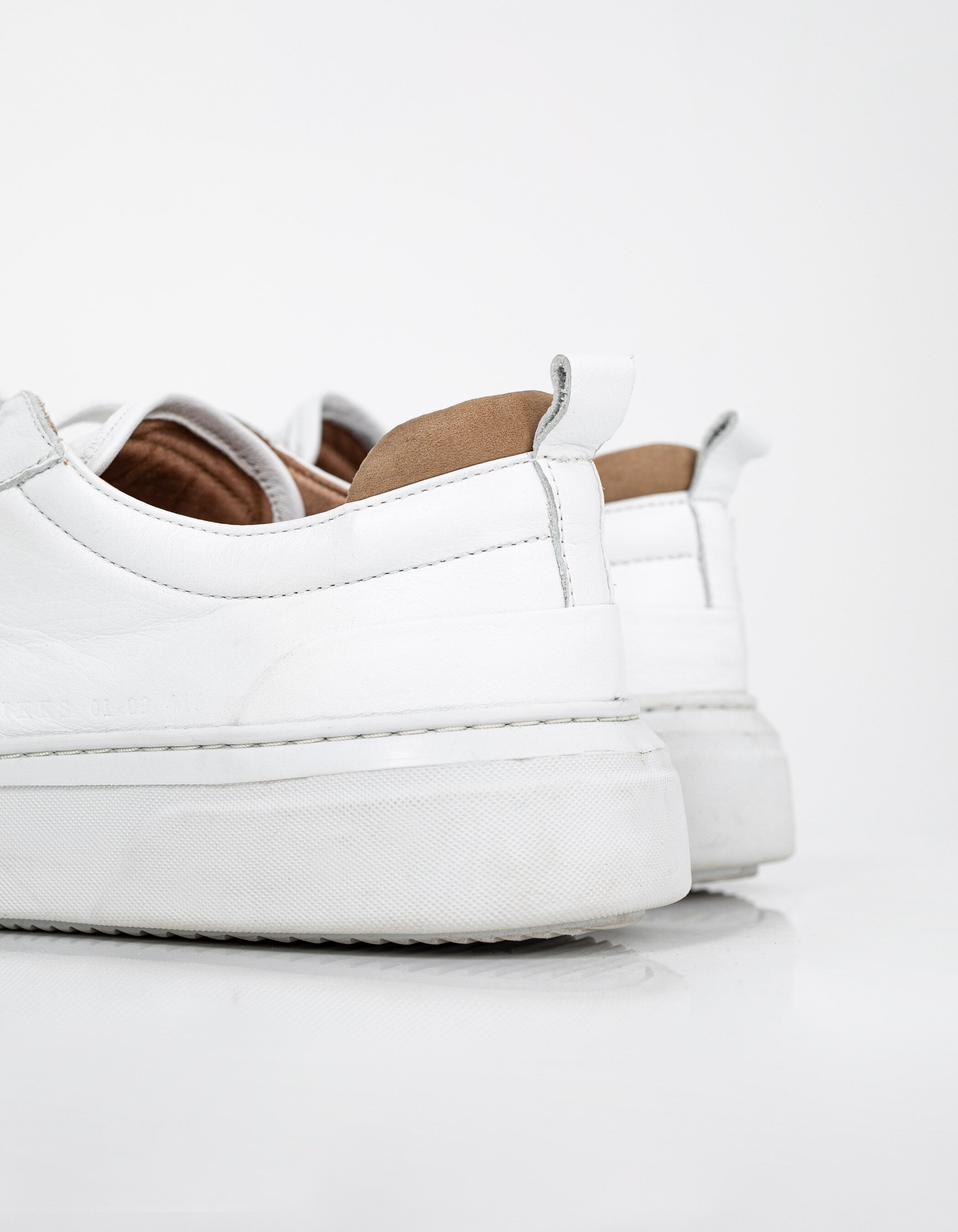 Men's white leather trainers