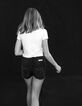 Girls’ used black denim shorts, fringed hem -1