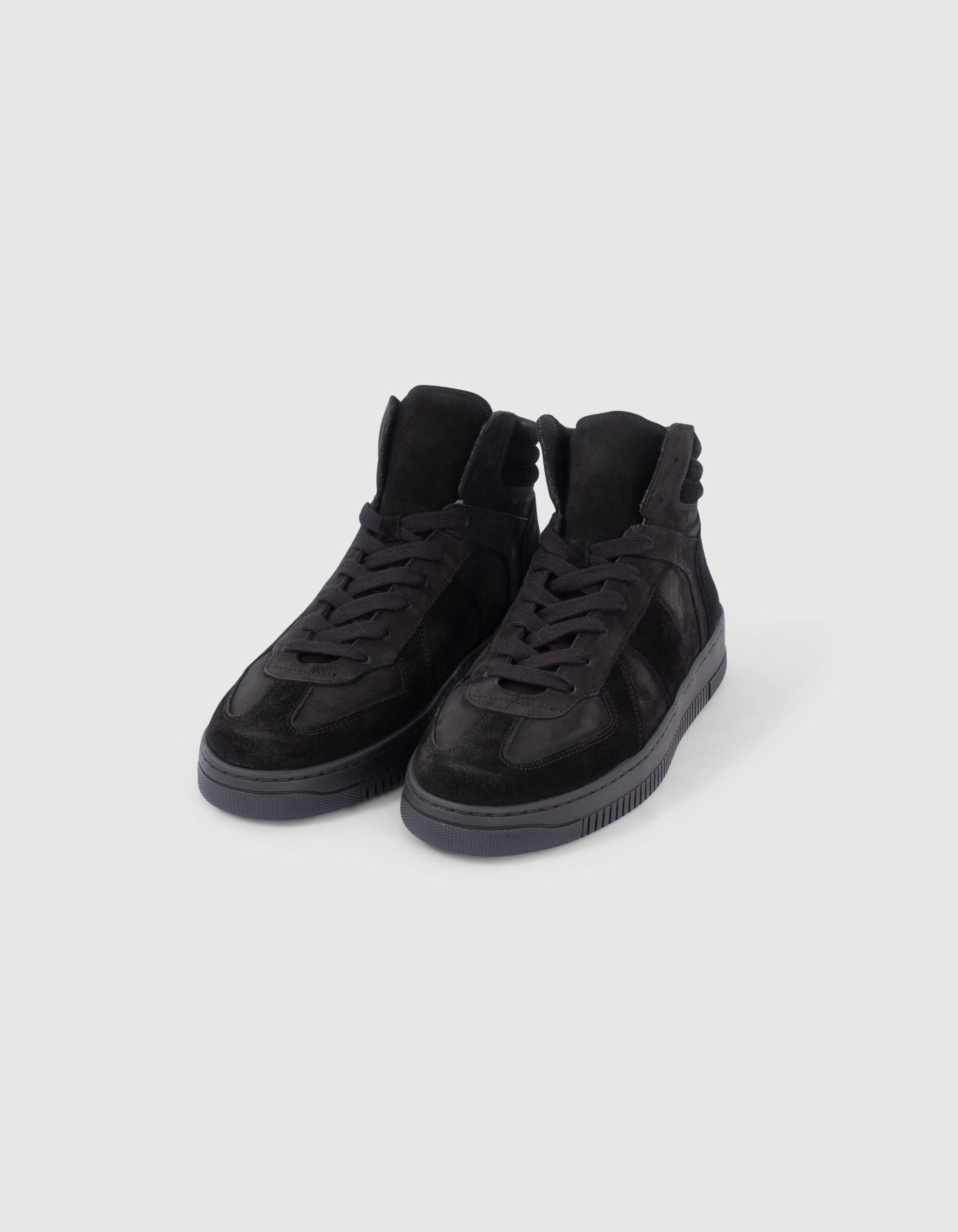 Zwarte sneakers hotsell leer