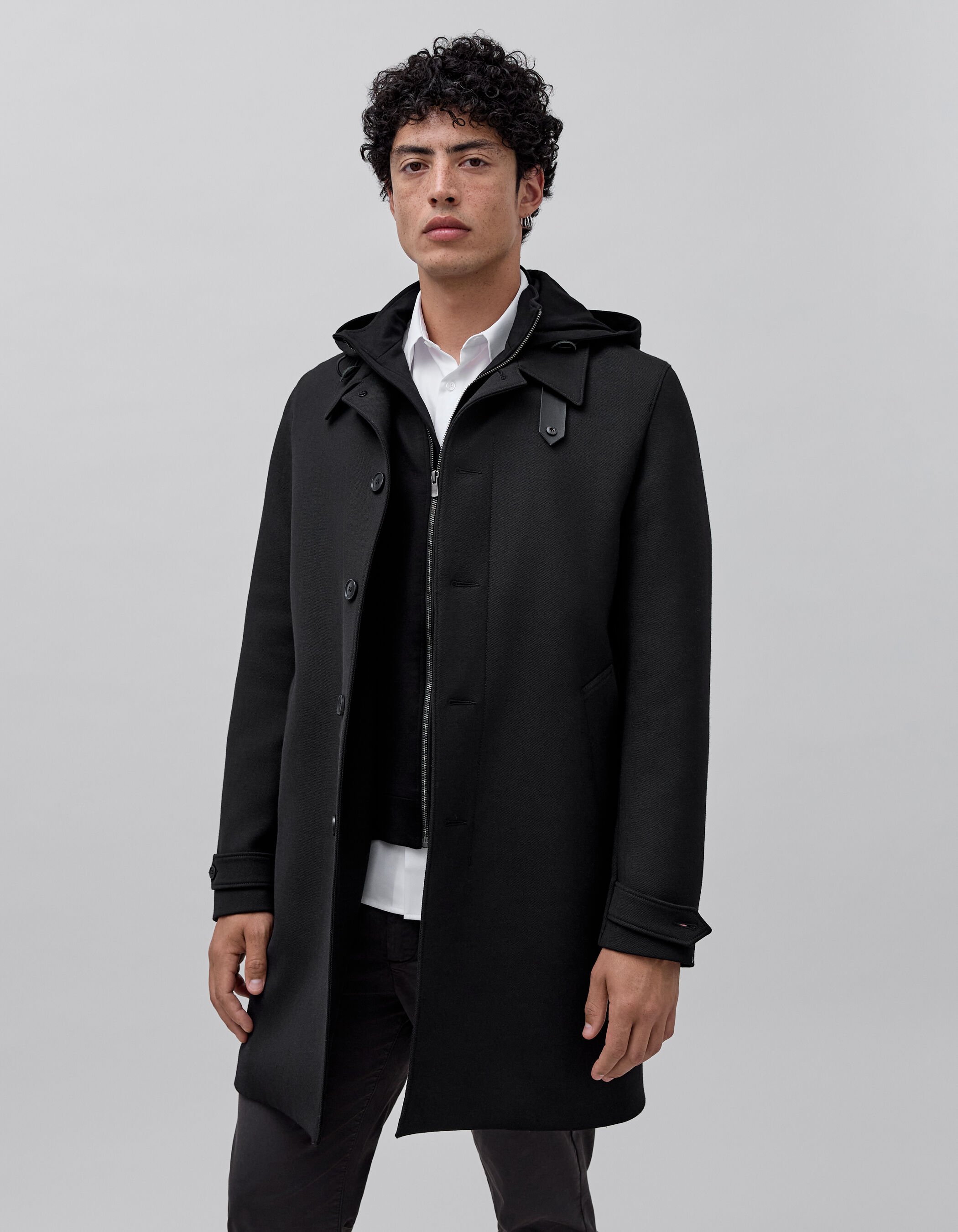 Man in black online trench coat