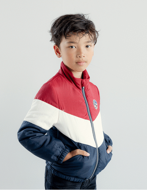 Parka 2 en 1 azul marino y plumas color block niño