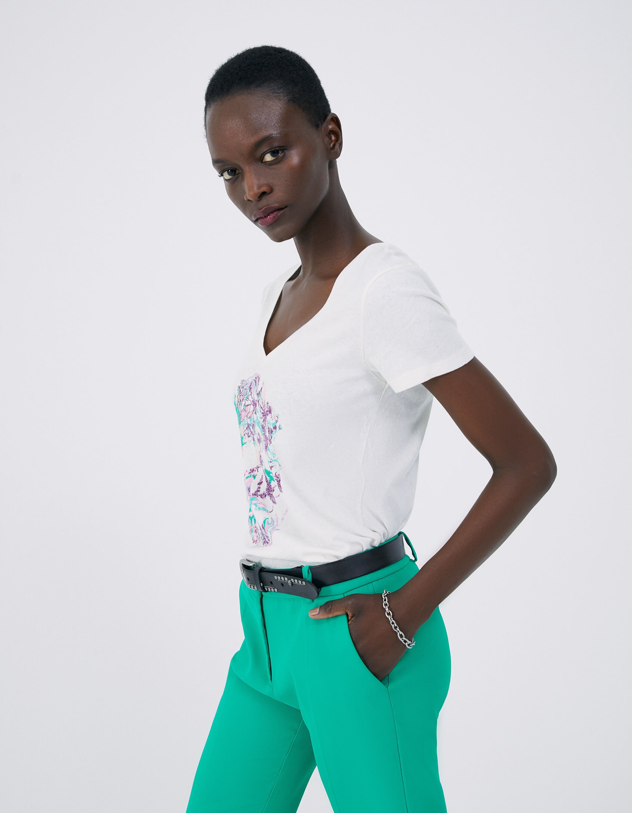 Women s white flower and skull image T shirt