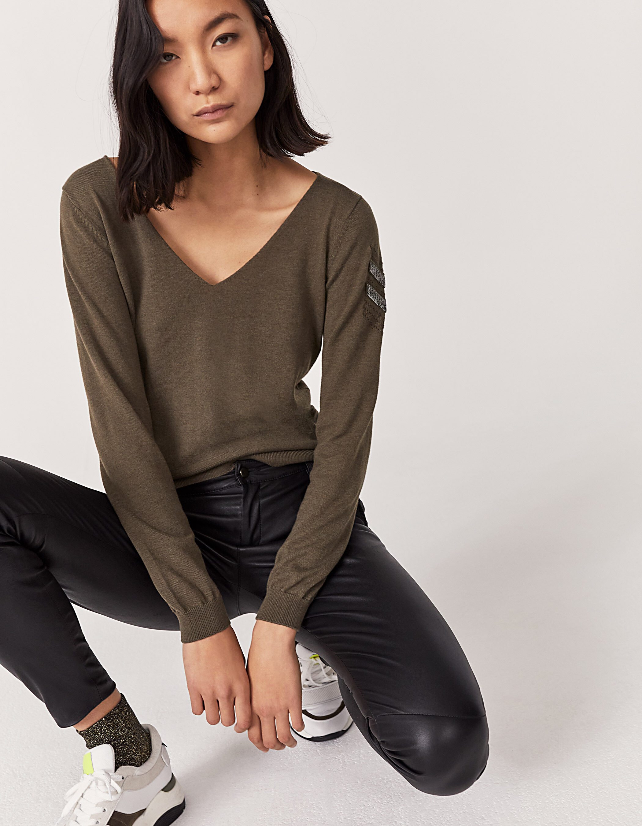khaki military-style beaded knit sweater