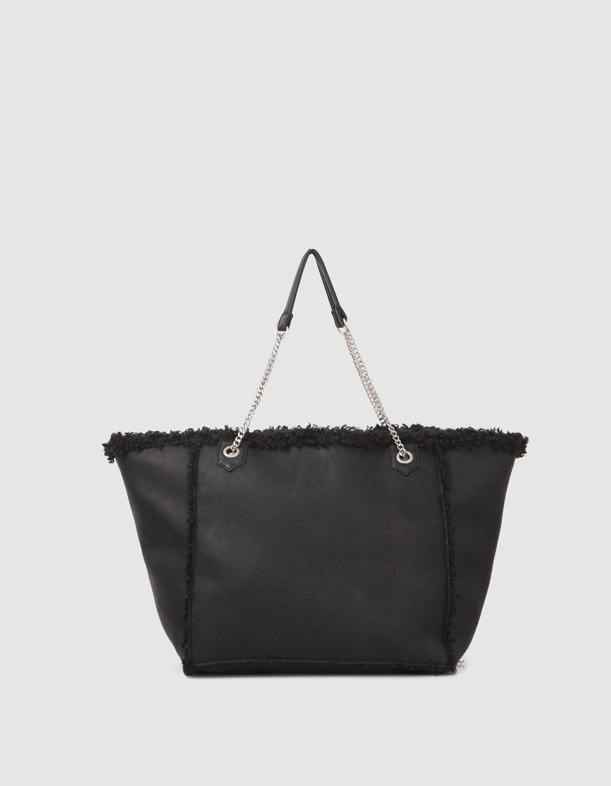 Women s black reversible oversized furry tote bag