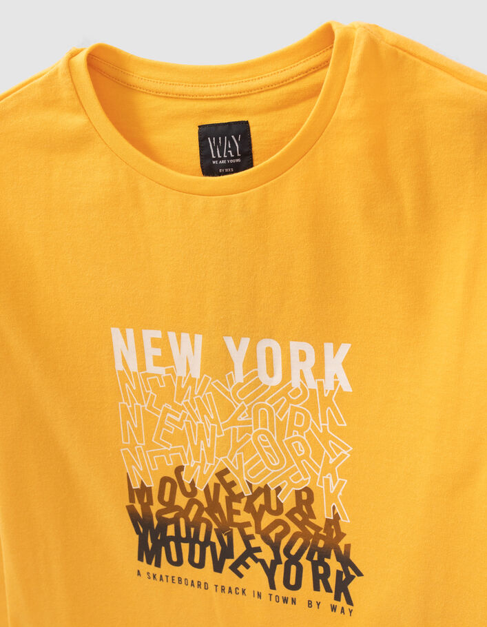 Camiseta amarilla algodón ecológico marcas letras niño