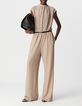Dames jumpsuit met visgraatmotief in goud-1