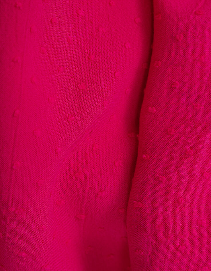 Vestido rosa vivo tejido gofrado plumetis niña-10