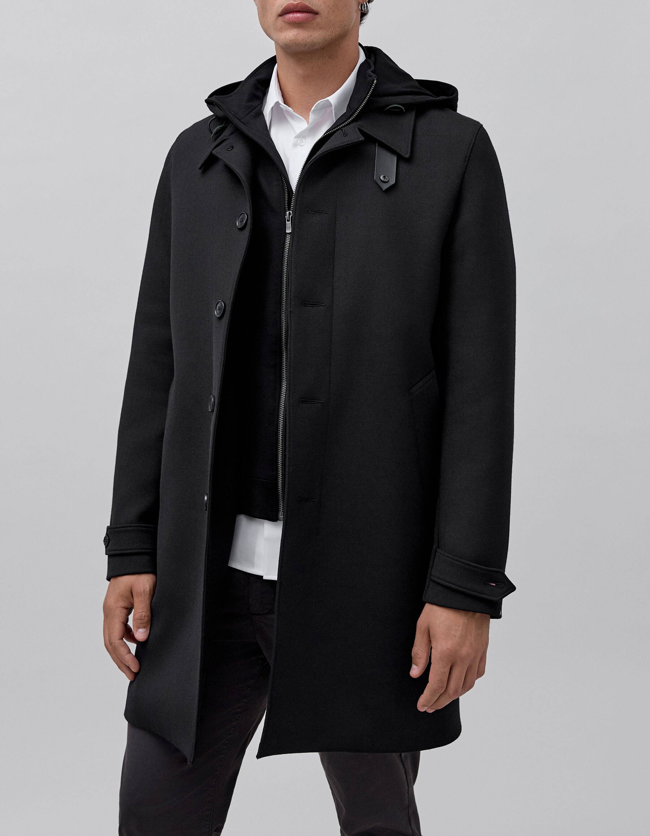 Men's black trench coat with detachable hood facing IKKS