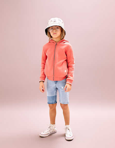 Boy’s coral cardigan with stamped marking on sleeves
