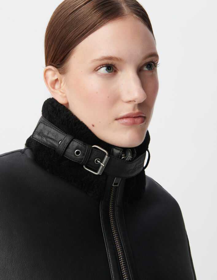 Manteau noir mi-long peau retournée Femme
