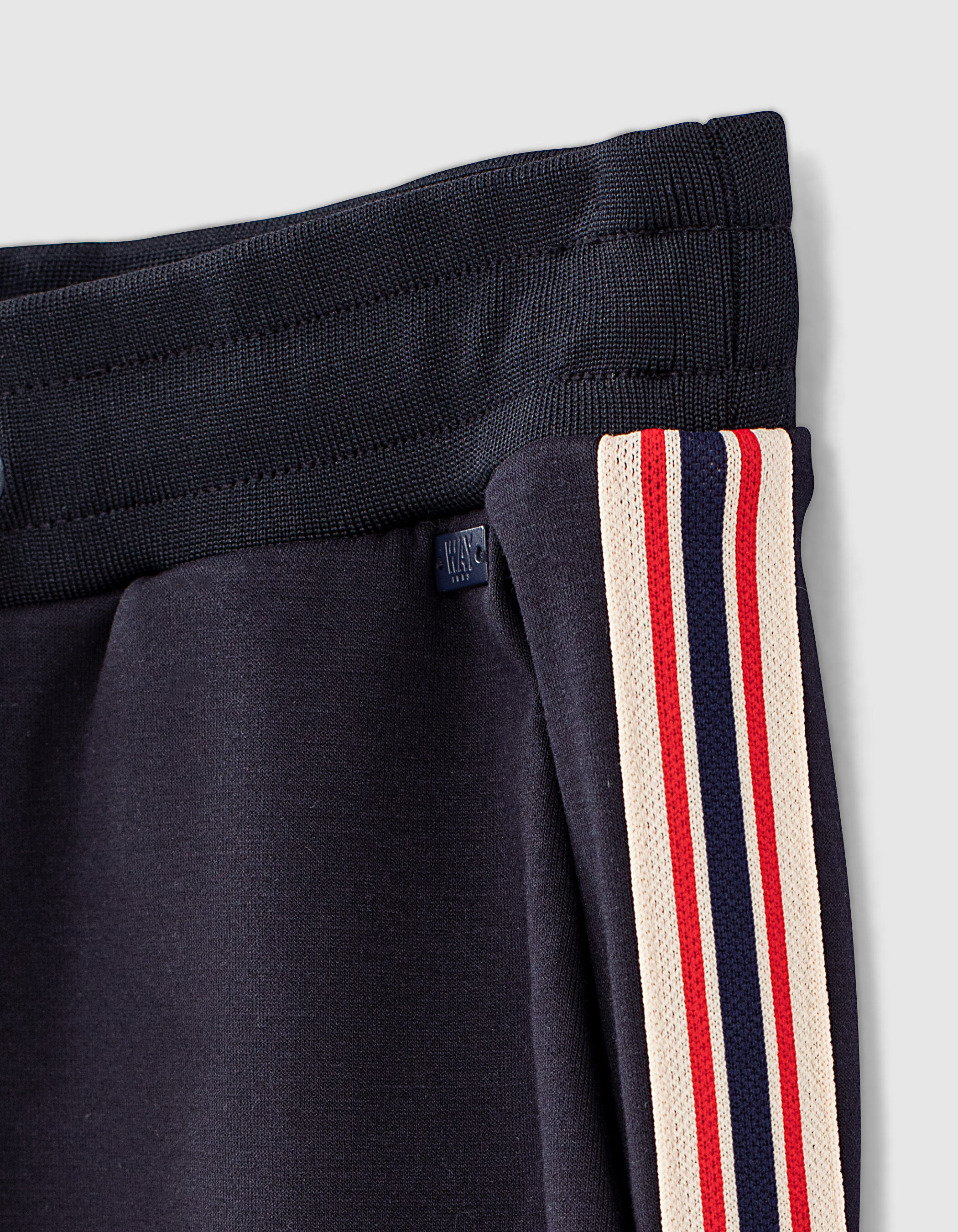 Boys' navy joggers with striped ribbed 