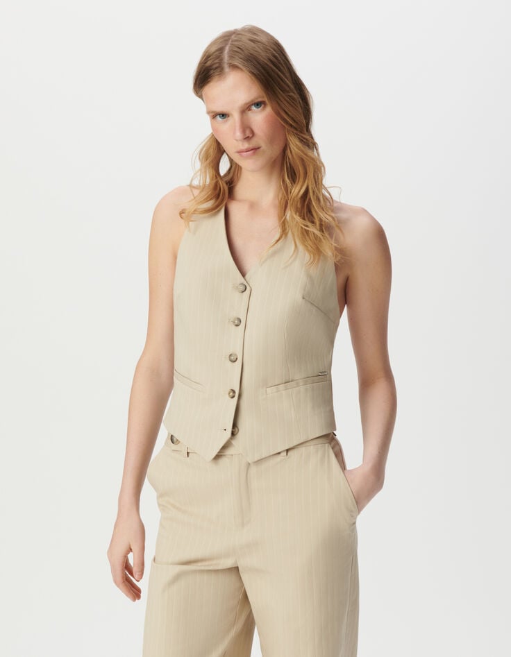 Gilet de tailleur beige dos-nu motif rayures tennis Femme-1 Gilet de tailleur beige dos-nu motif rayures tennis Femme-1