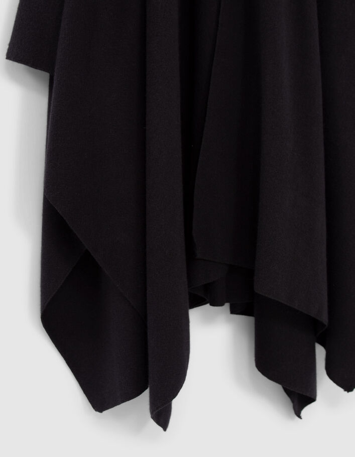 Women's black fleece poncho with fringed back