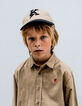 Boy’s camel cap with embroidered bouclette lightning-K-1