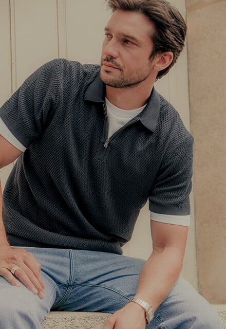 Marineblauw, opengewerkt gebreid poloshirt met korte mouwen