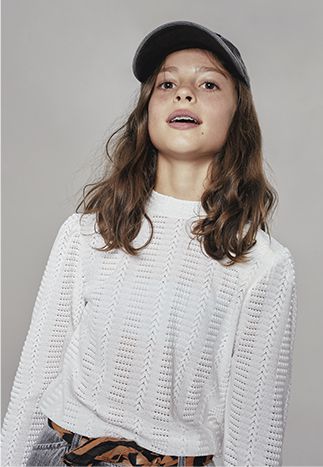 Girls’ white openwork knit sweater