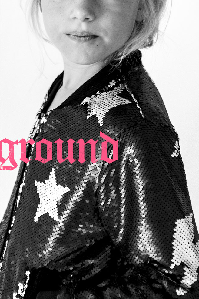 Bomber à sequins noirs et argentés à motifs étoile