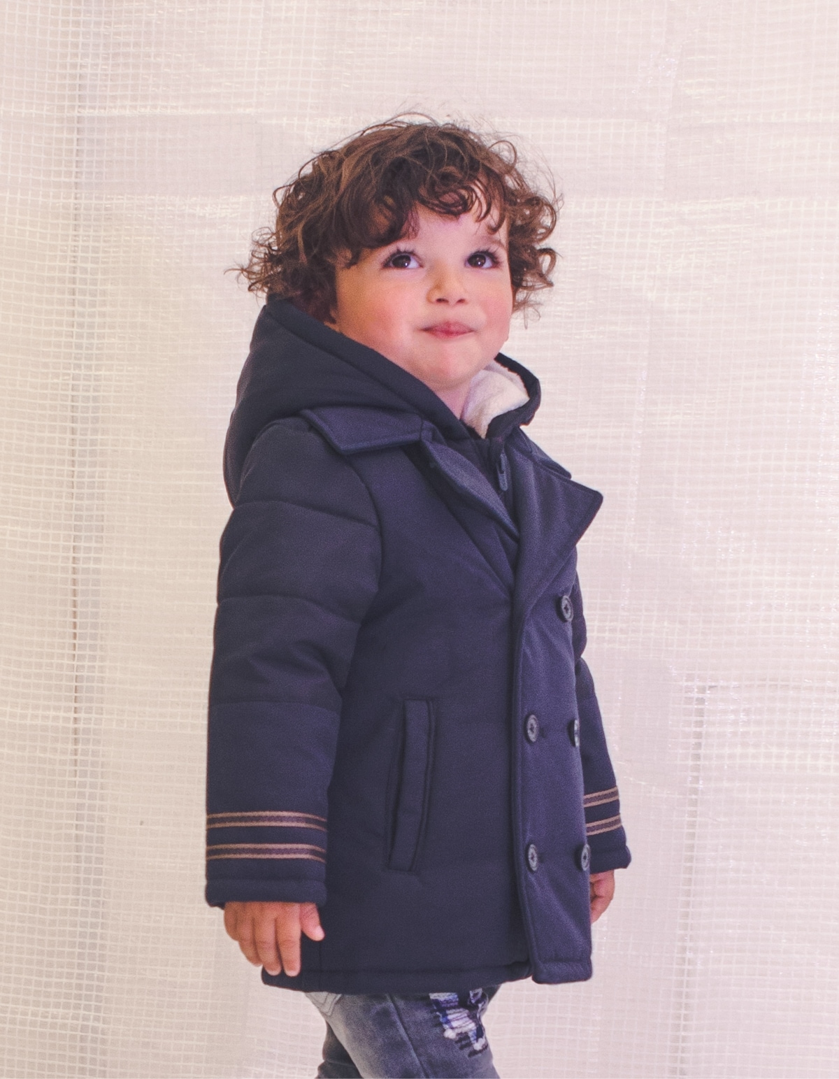 Baby boys’ navy parka with black quilted facing