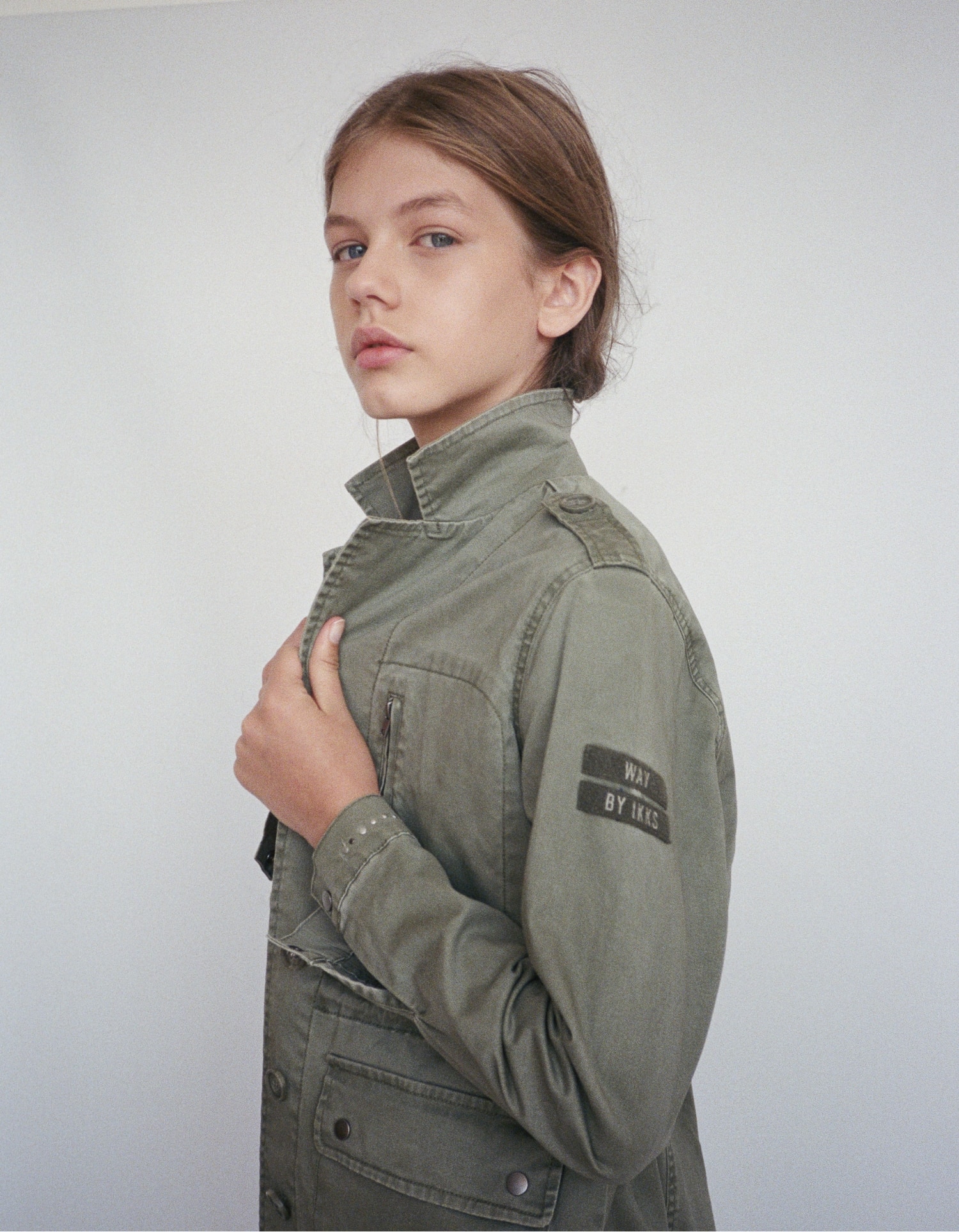 Girls’ worn khaki safari jacket + army braid/print on back