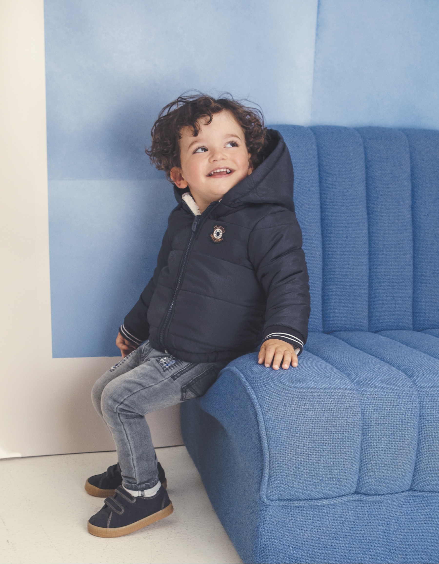 Baby boy’s navy and white Sherpa reversible padded jacket