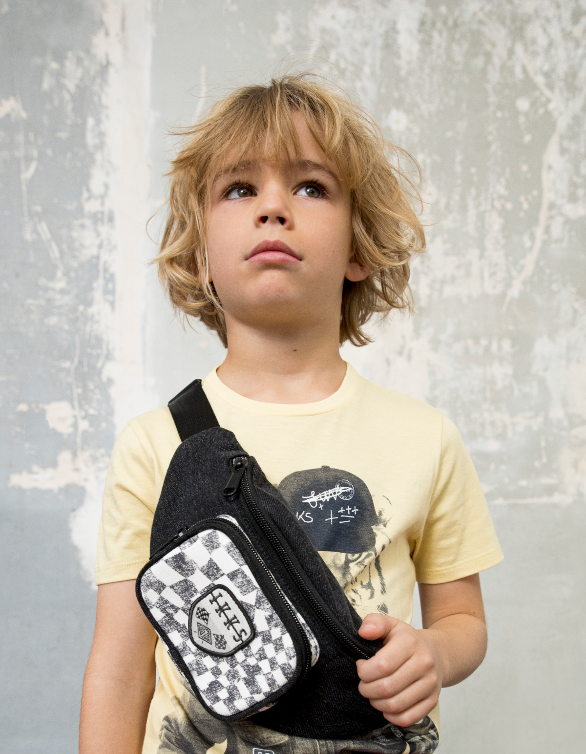 Boys’ black denim waist bag with checkerboard pocket