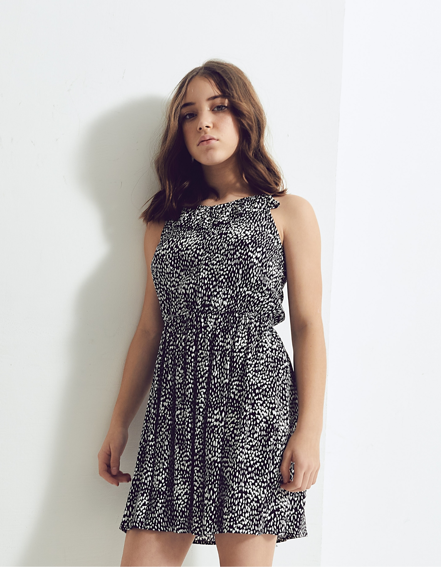 Girls’ black Ecovero® strap dress with heart-print