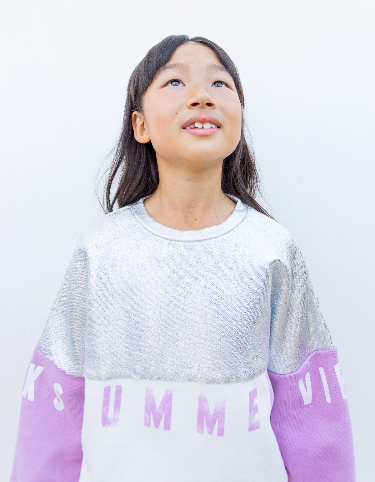 Sweater gebroken wit, zilver en lichtpaars tekst meisjes