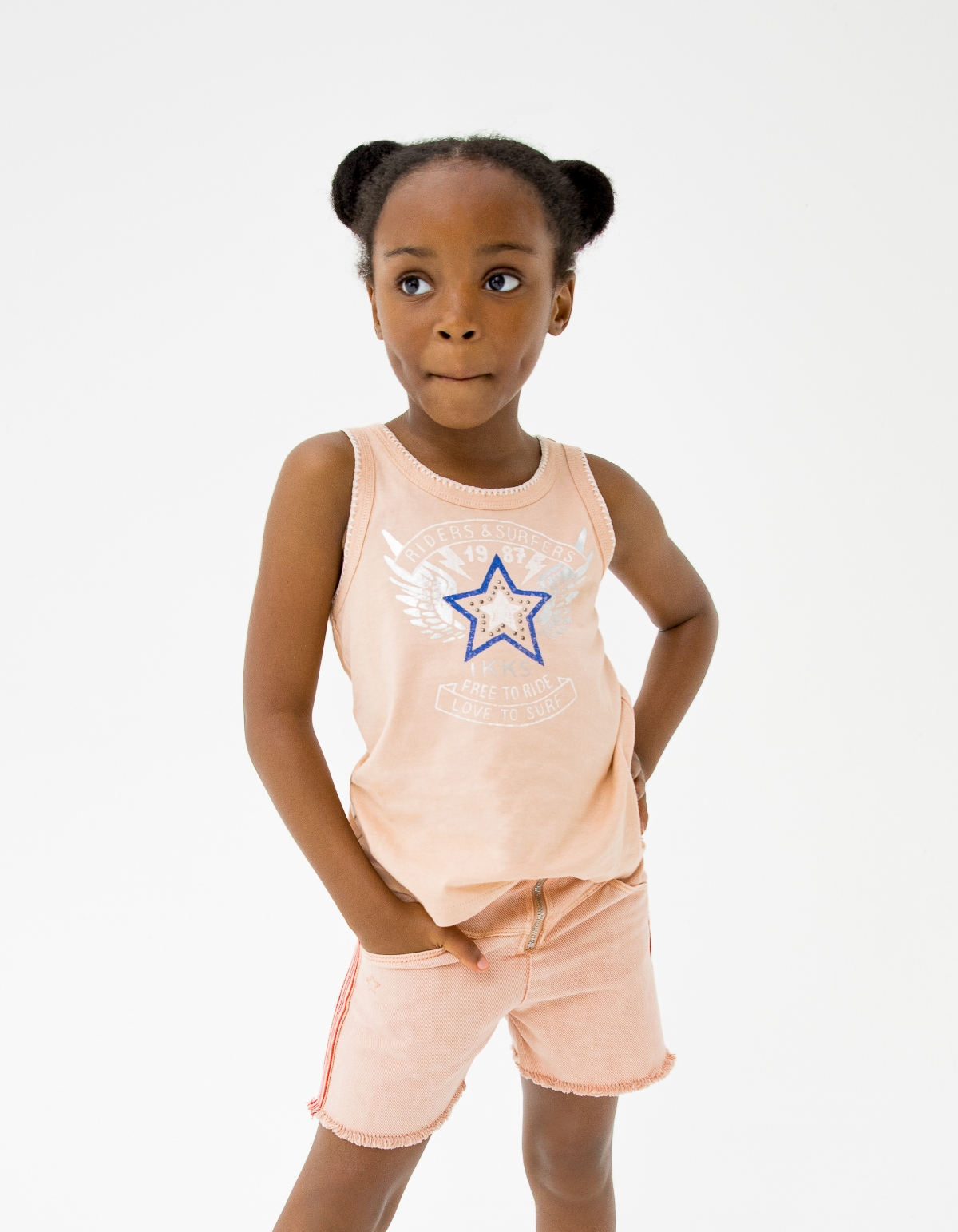 Girls’ pink denim shorts with striped braid down sides